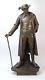 August Kuhne Antique Austrian Bronze Statue Man Period Clothing Walking Stick